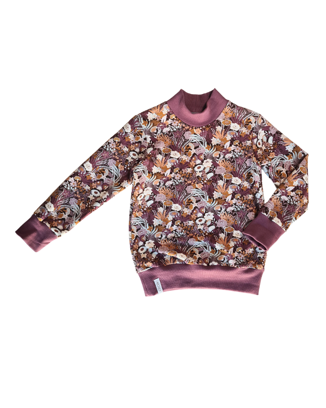 Geblümtes Longsleeve in Größe 116/122 mit lila Bündchen. Hochwertige, nachhaltige Kinderkleidung mit stilvollem Muster und angenehmem Tragekomfort.