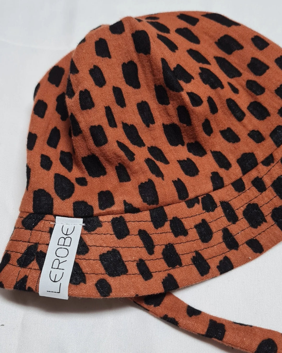 Baby Sonnenhut aus Bio-Musselin – Gr. 50-68